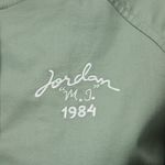 Jordan-Campera-universitaria-para-mujer